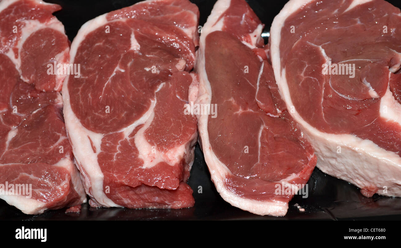 Raw lamb steaks red meat Stock Photo