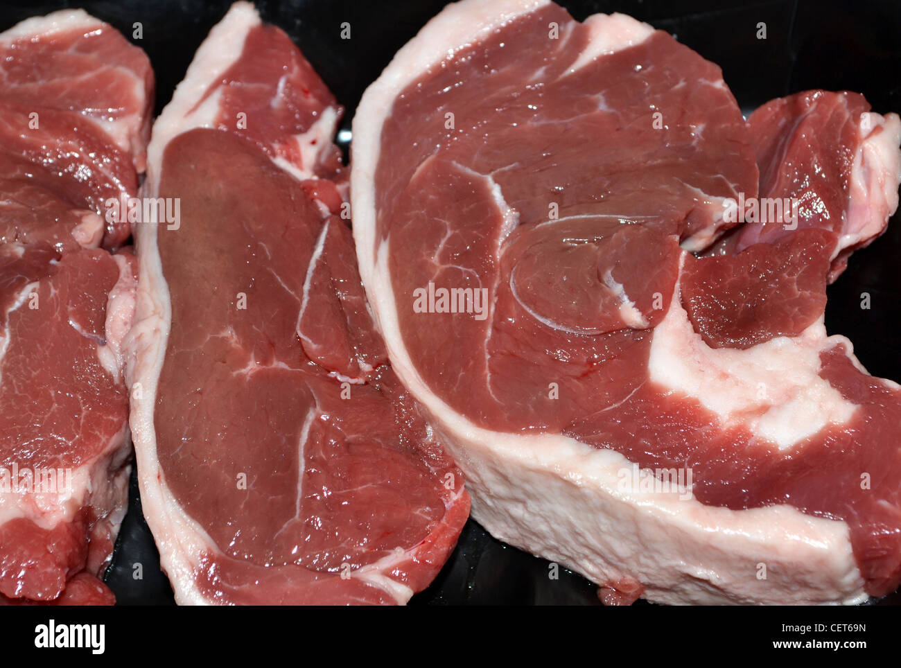 Raw lamb steaks red meat Stock Photo