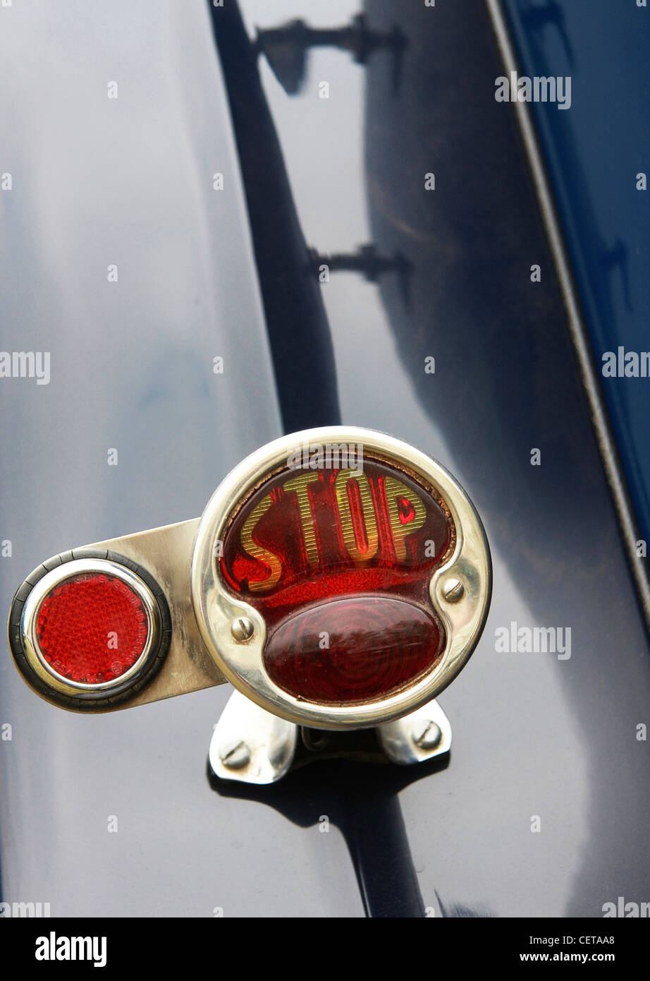 Stop light reflector on back of classic car at Goodwood Revival. Stock Photo