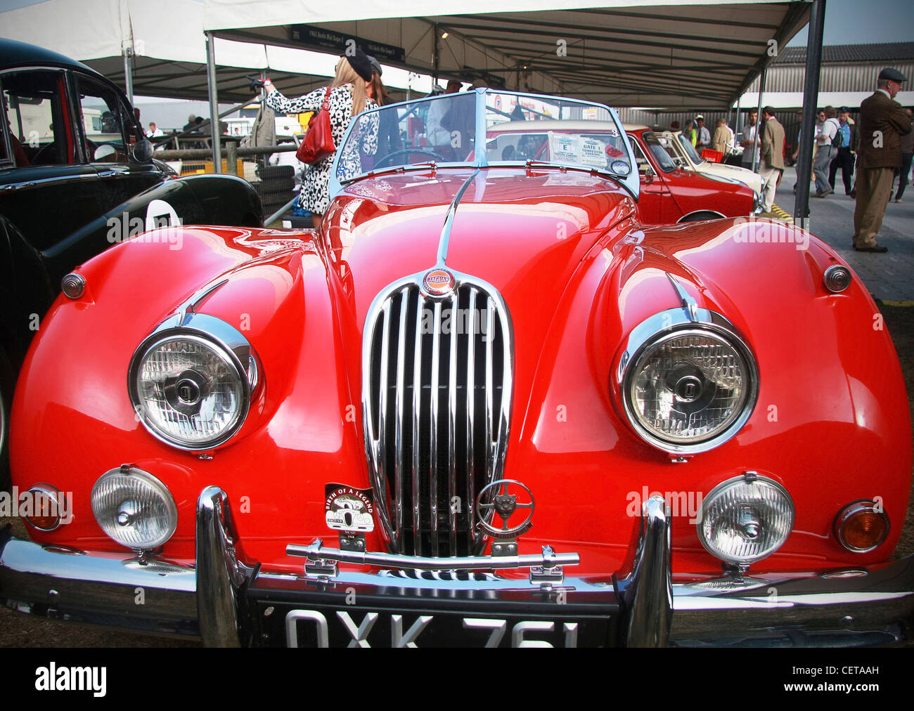 Front view of a red retro Jaguar at Goodwood Revival. Stock Photo