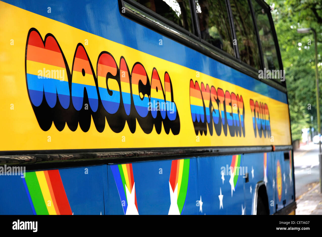 The colourful Magical Mystery Tour bus. The tour offers visitors a 2 hour long trip around Liverpool visiting places associated Stock Photo