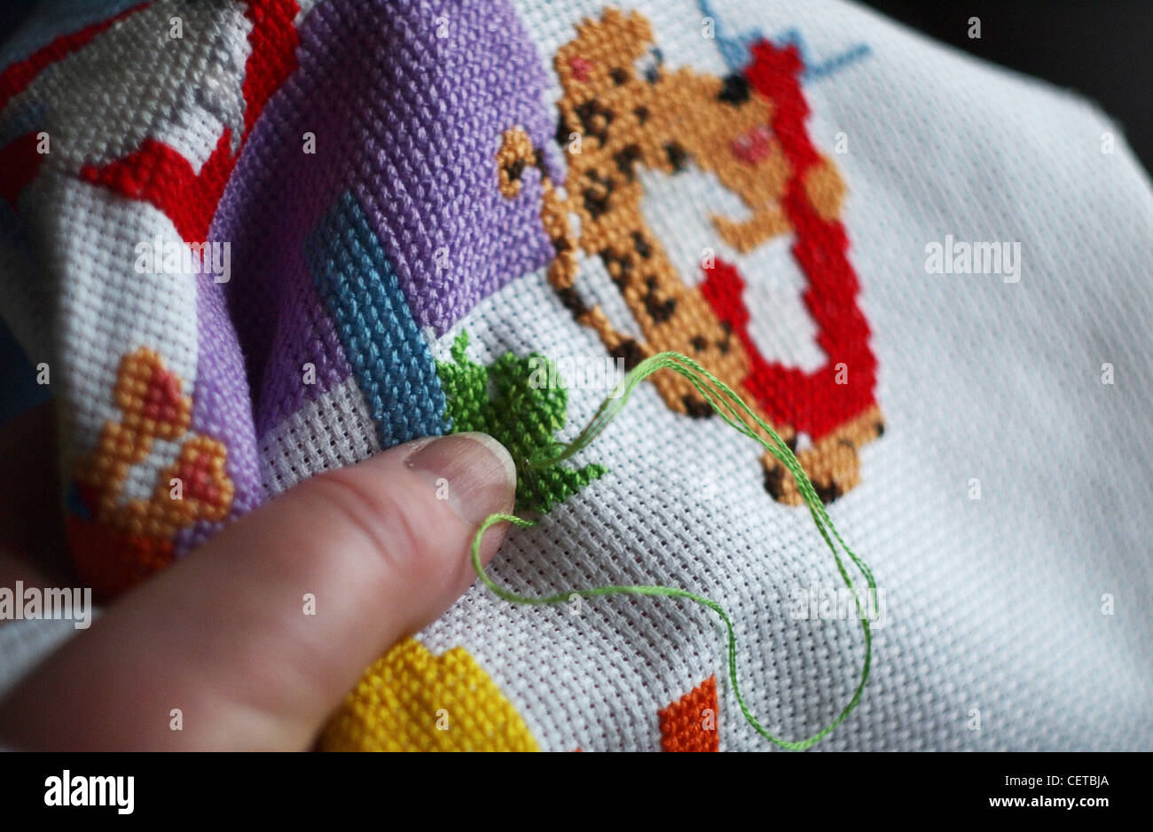 Cross stitching in close up Stock Photo