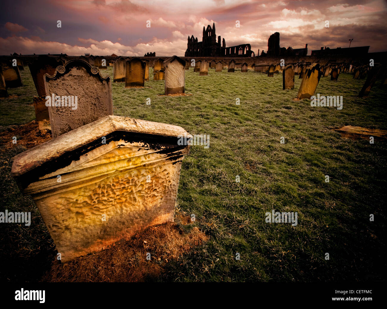 A view from the cemetery to the ruins of Whitby Abbey. Stock Photo