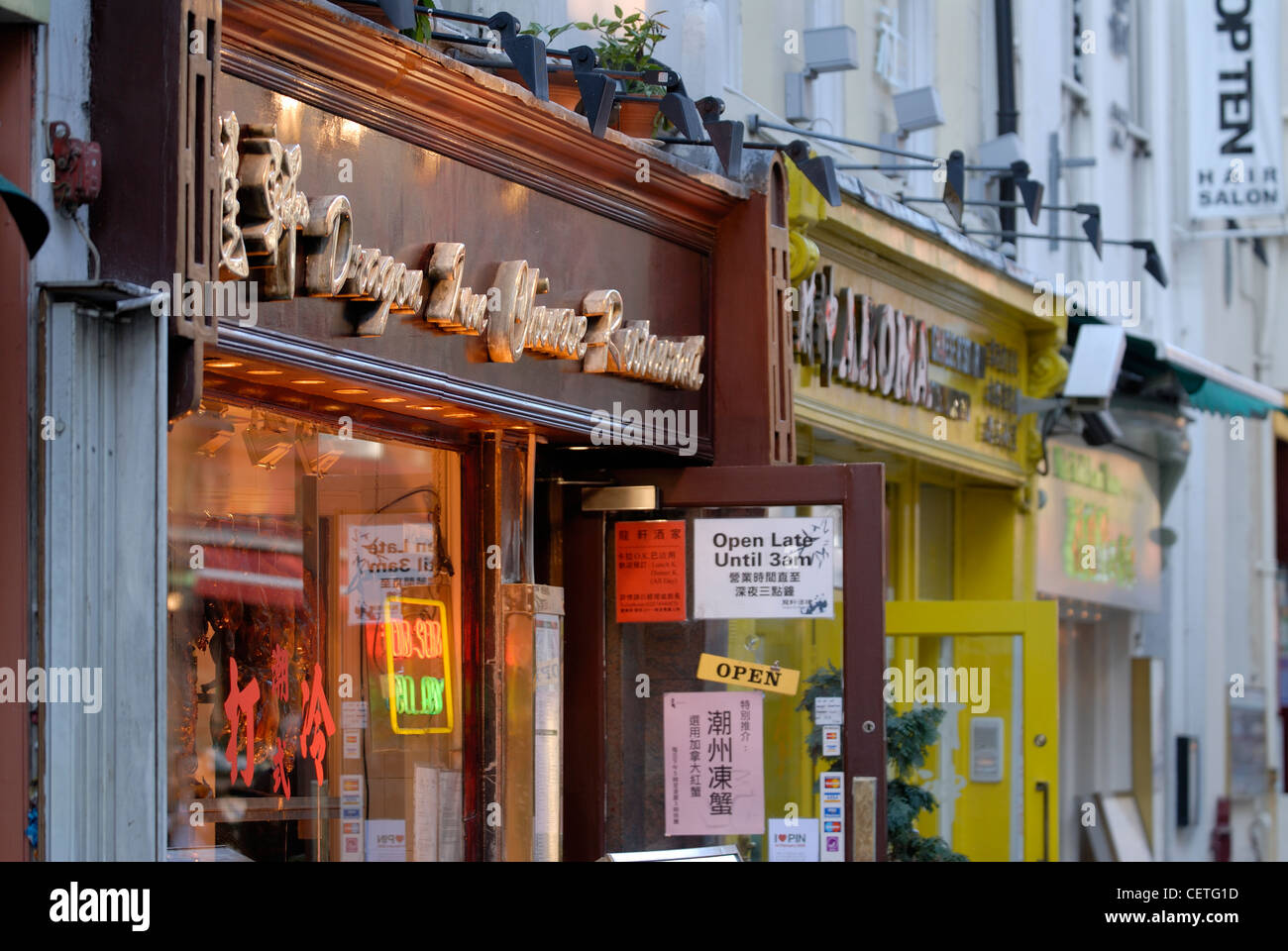 Restaurants in Chinatown. London's original Chinatown was established in the Limehouse district in the late 19th century. Stock Photo