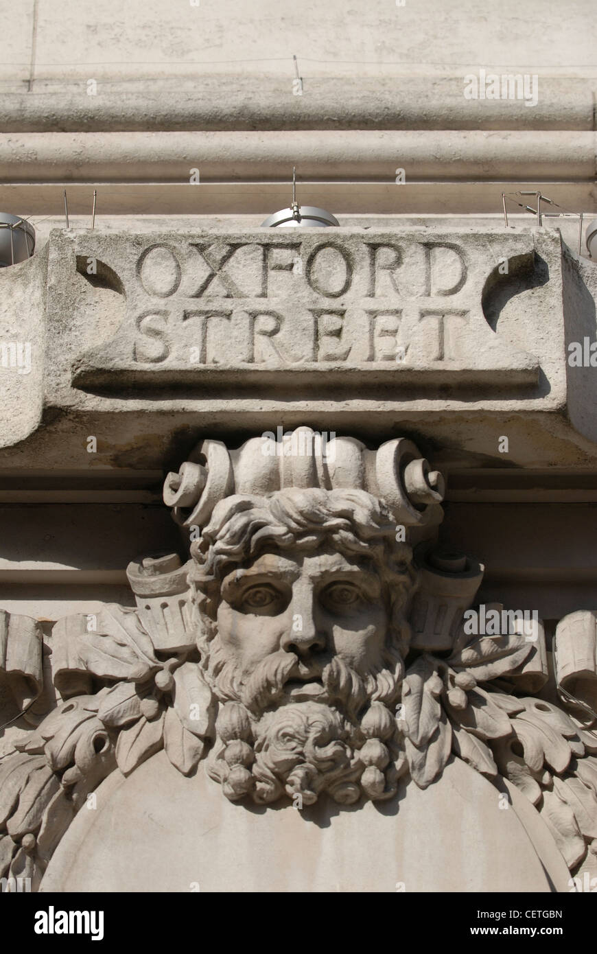 Detail of sculpted road sign. The development of Oxford Street as a prime shopping area began at the start of 20th century with Stock Photo