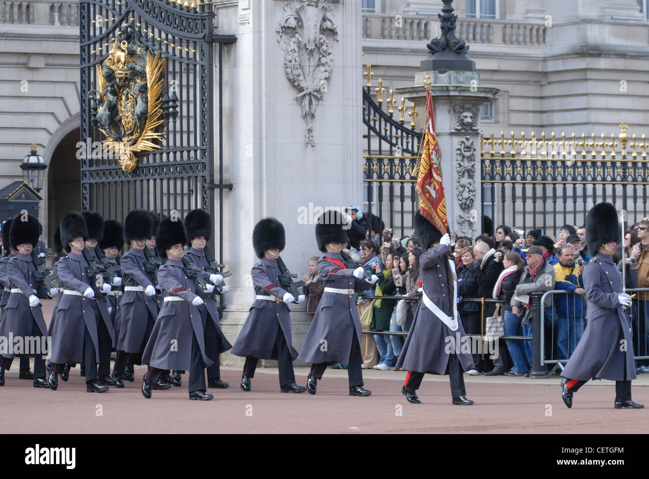 Changing the guard at Buckingham Palace. The household troops have guarded the sovereign and the royal palaces since 1660 and wh Stock Photo