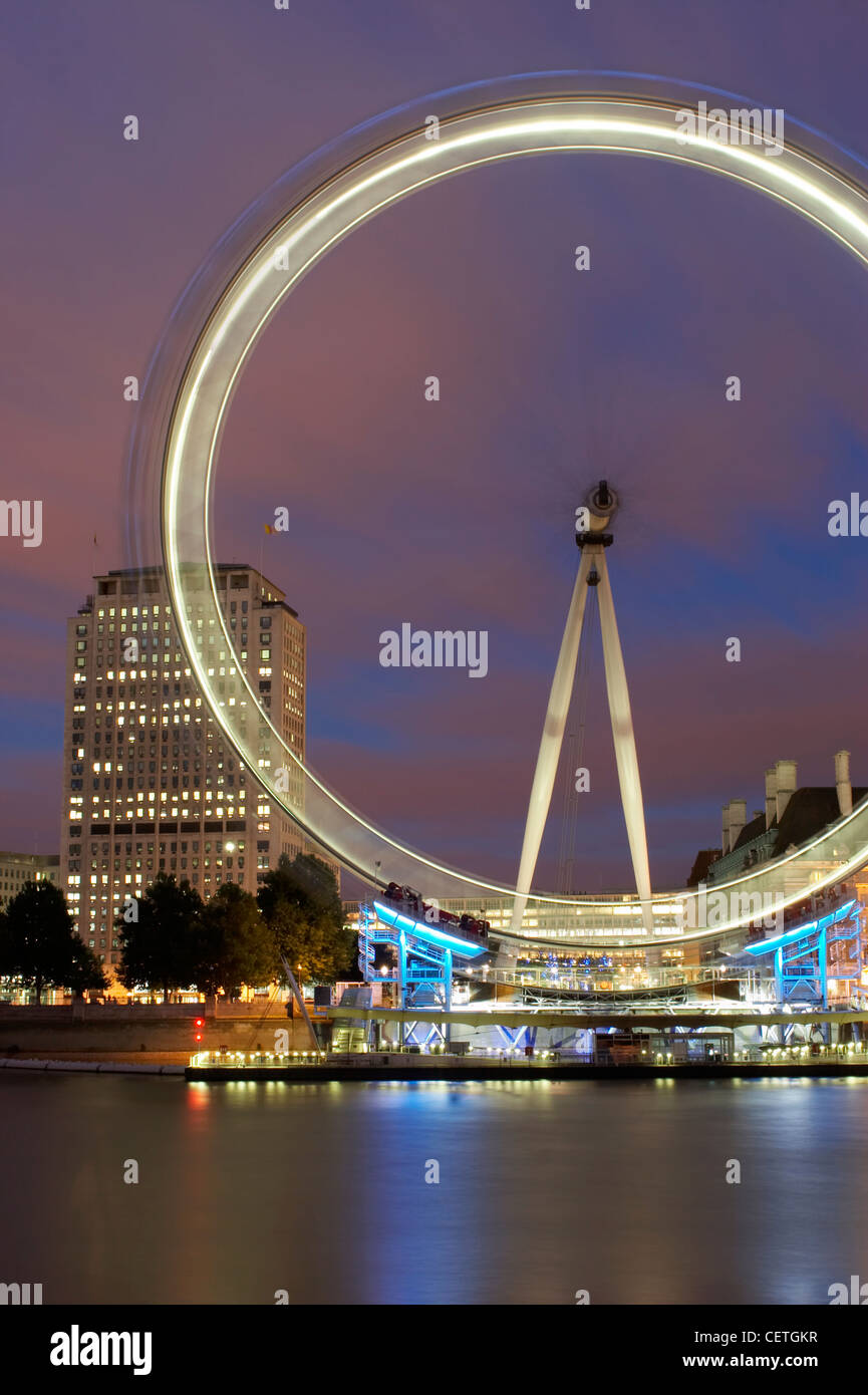 London Eye at Night. The British Airways London Eye is the world's tallest observation wheel at 135m high. Stock Photo
