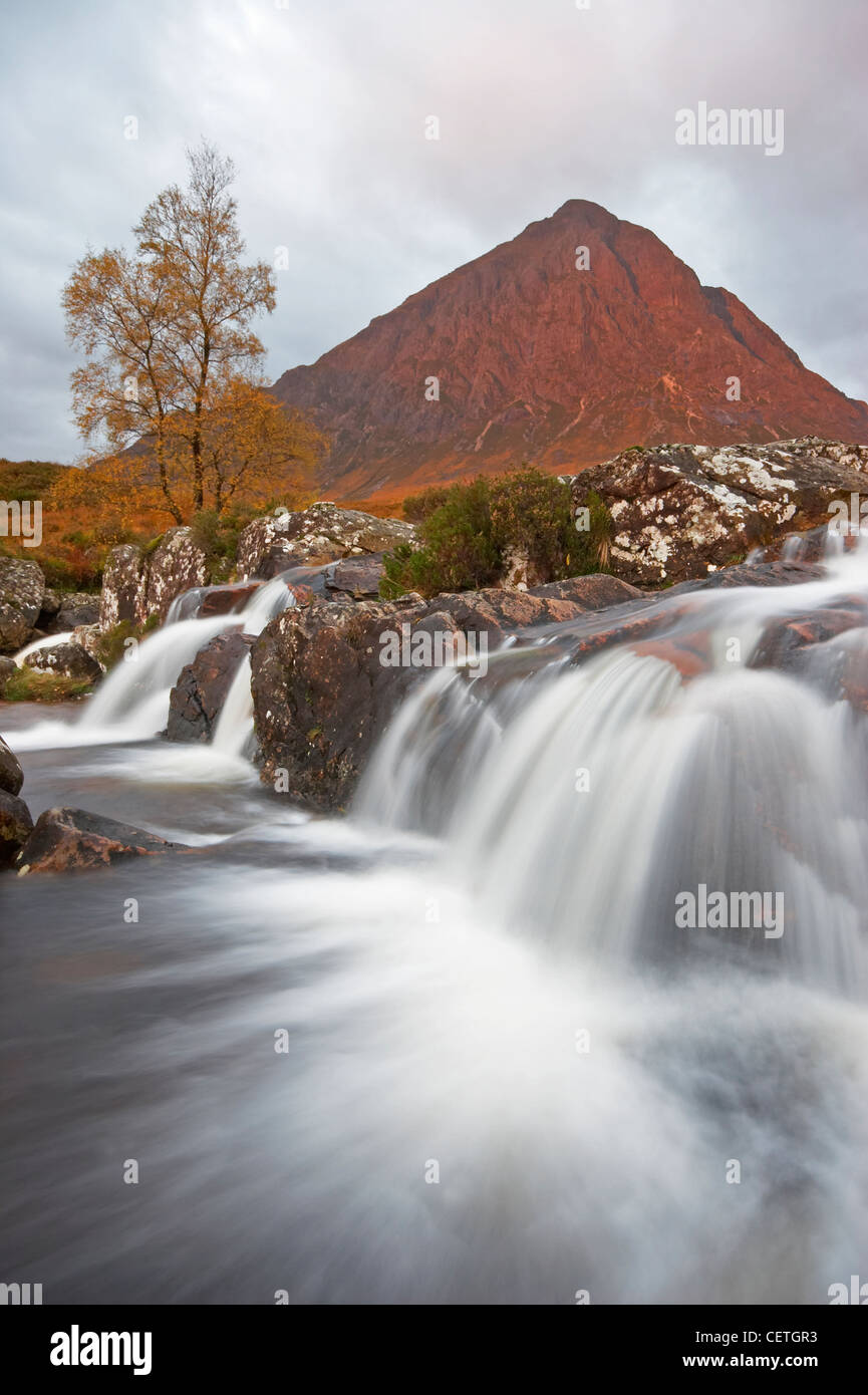 Etive Moor at sunrise on a stormy day. Standing proud above the Rannoch Moor and guarding the entrance to Glencoe and Glen Etive Stock Photo