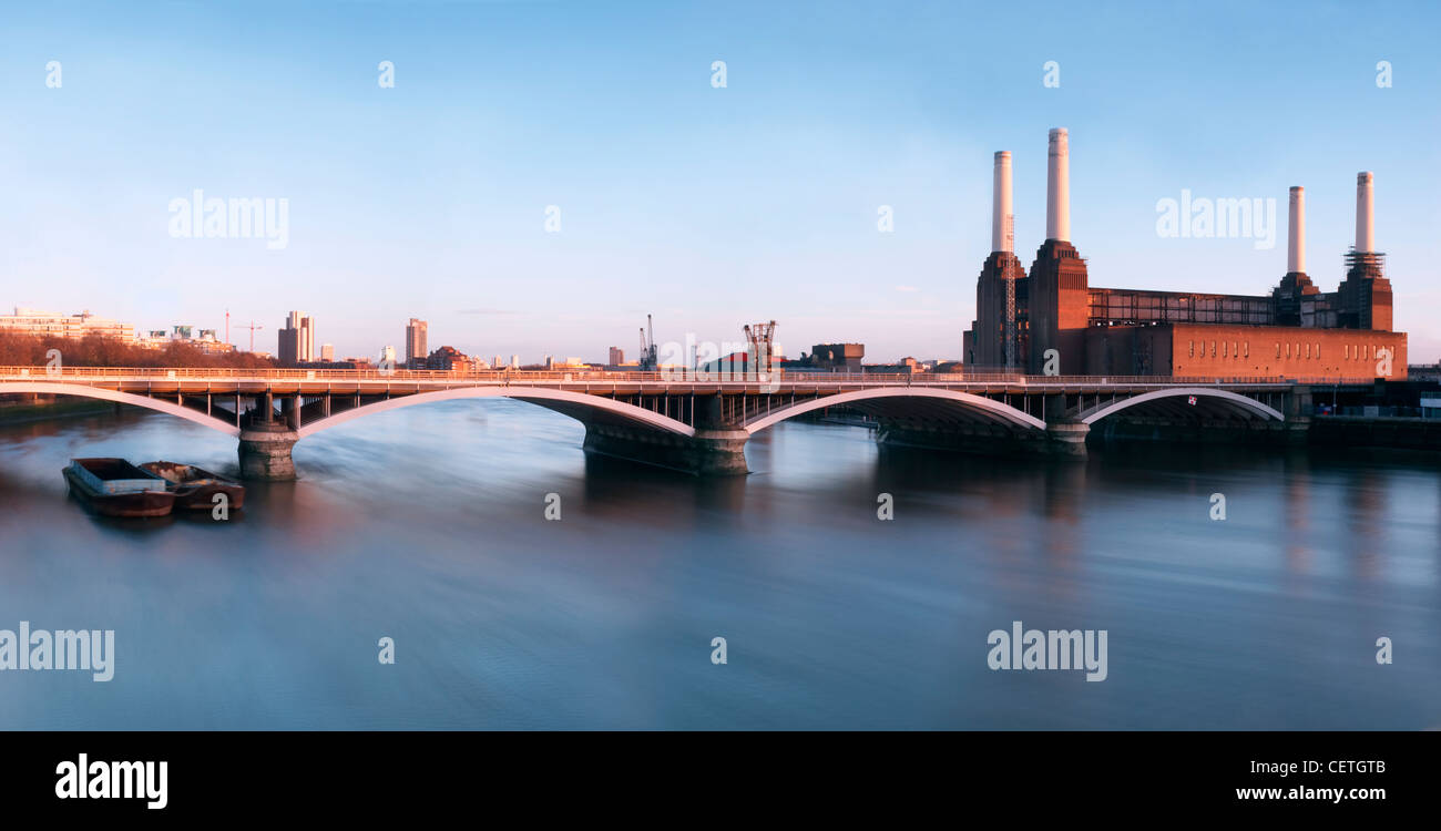 Battersea Power Station Panoramic with railway crossing. The proposal to site a large power station on the south bank of the Riv Stock Photo