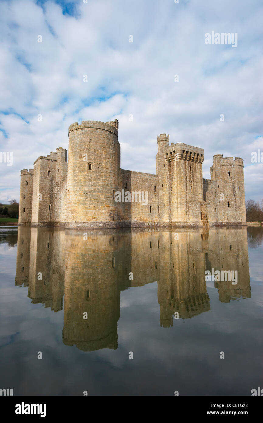 Bodiam Castle with Moat Reflections. One of the most famous and evocative castles in Britain, Bodiam was built in 1385, as both Stock Photo
