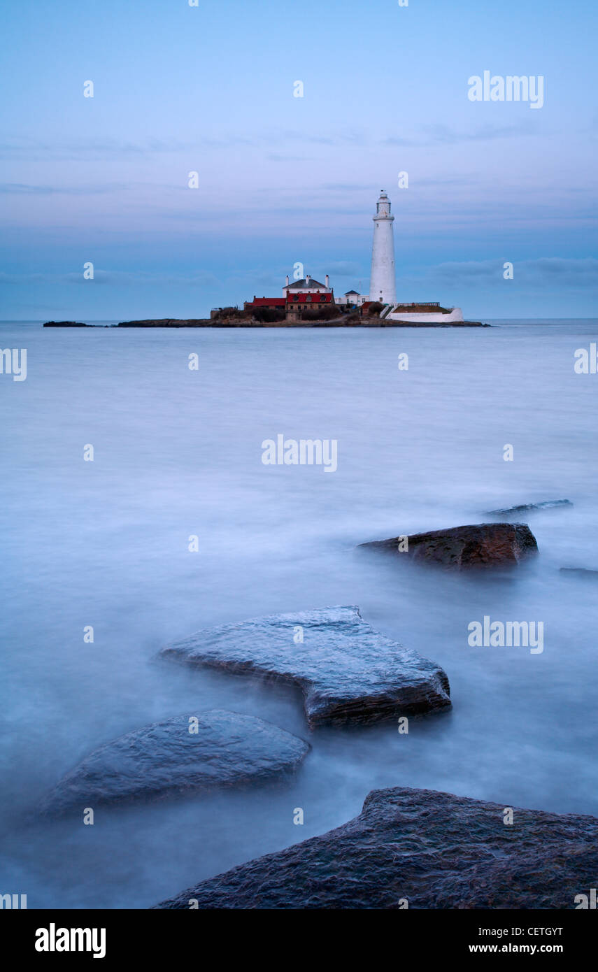 St Mary's lighthouse at high tide. The lighthouse is situated on St Mary's Island north of Whitely Bay. Stock Photo