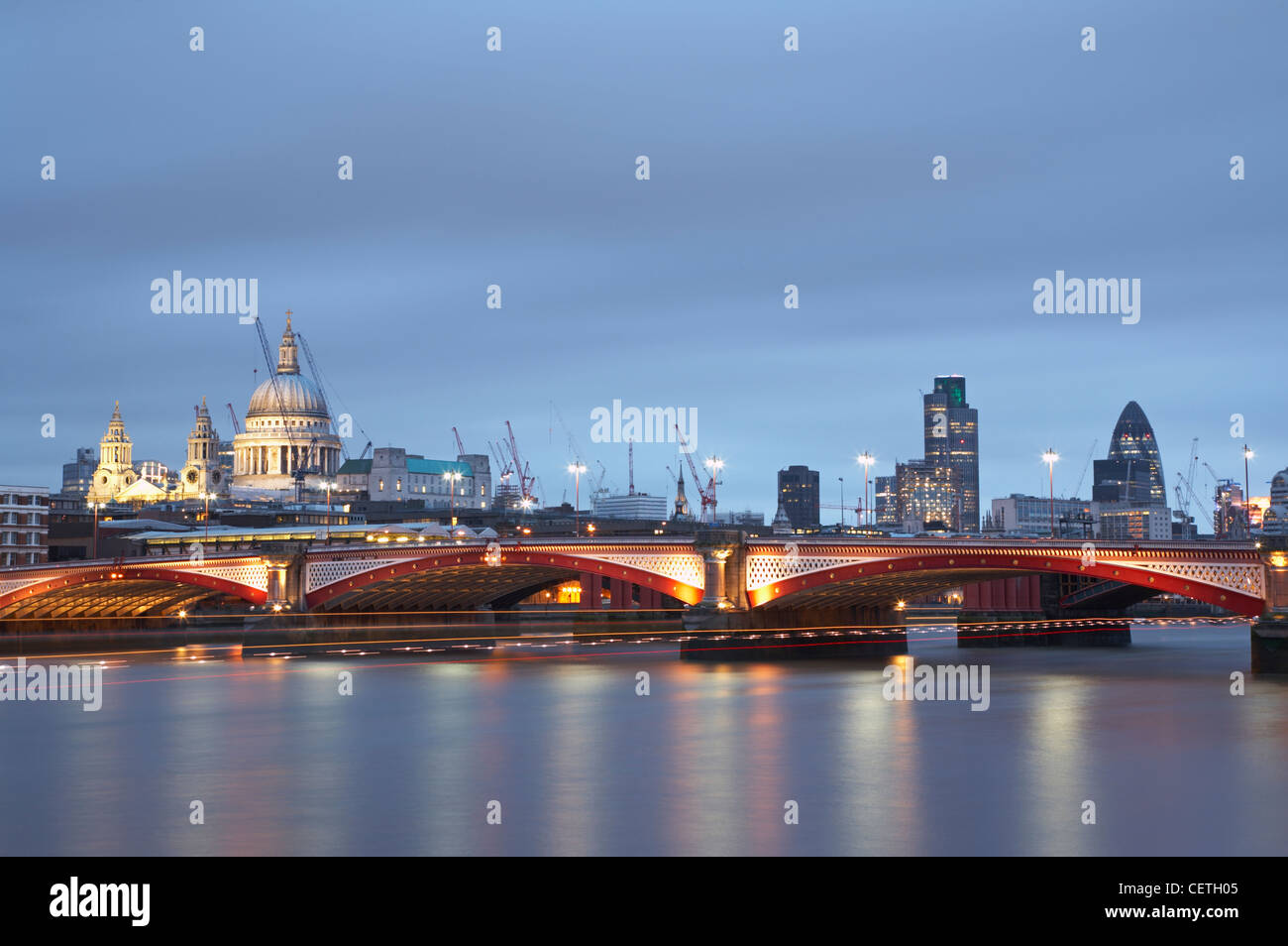 Blackfriars Bridge and St Paul's Cathedral viewed from the west. Blackfriars Bridge is 995 ft long and 42 ft wide but at the lay Stock Photo