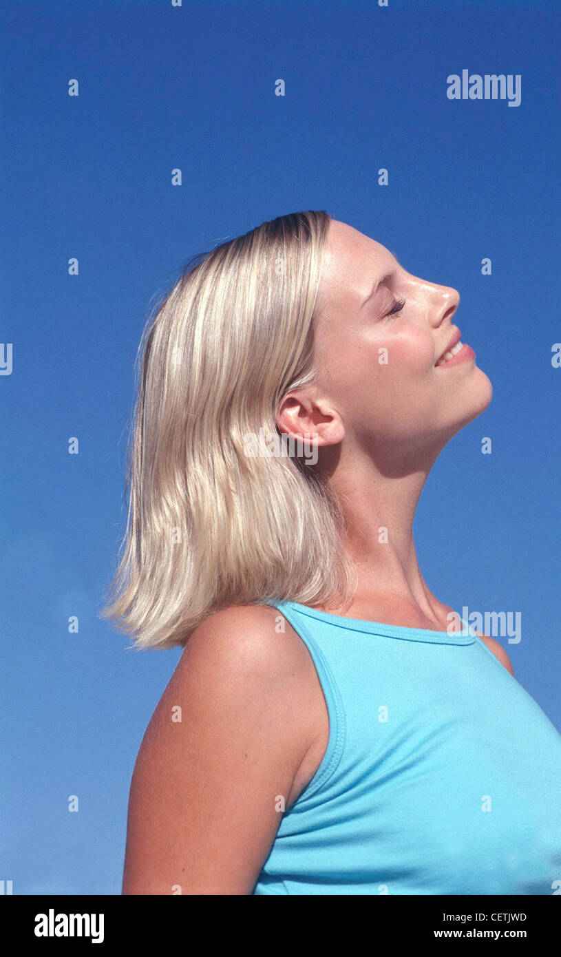 Profile Of Tanned Female Chin Length Blonde Hair Wearing Subtle