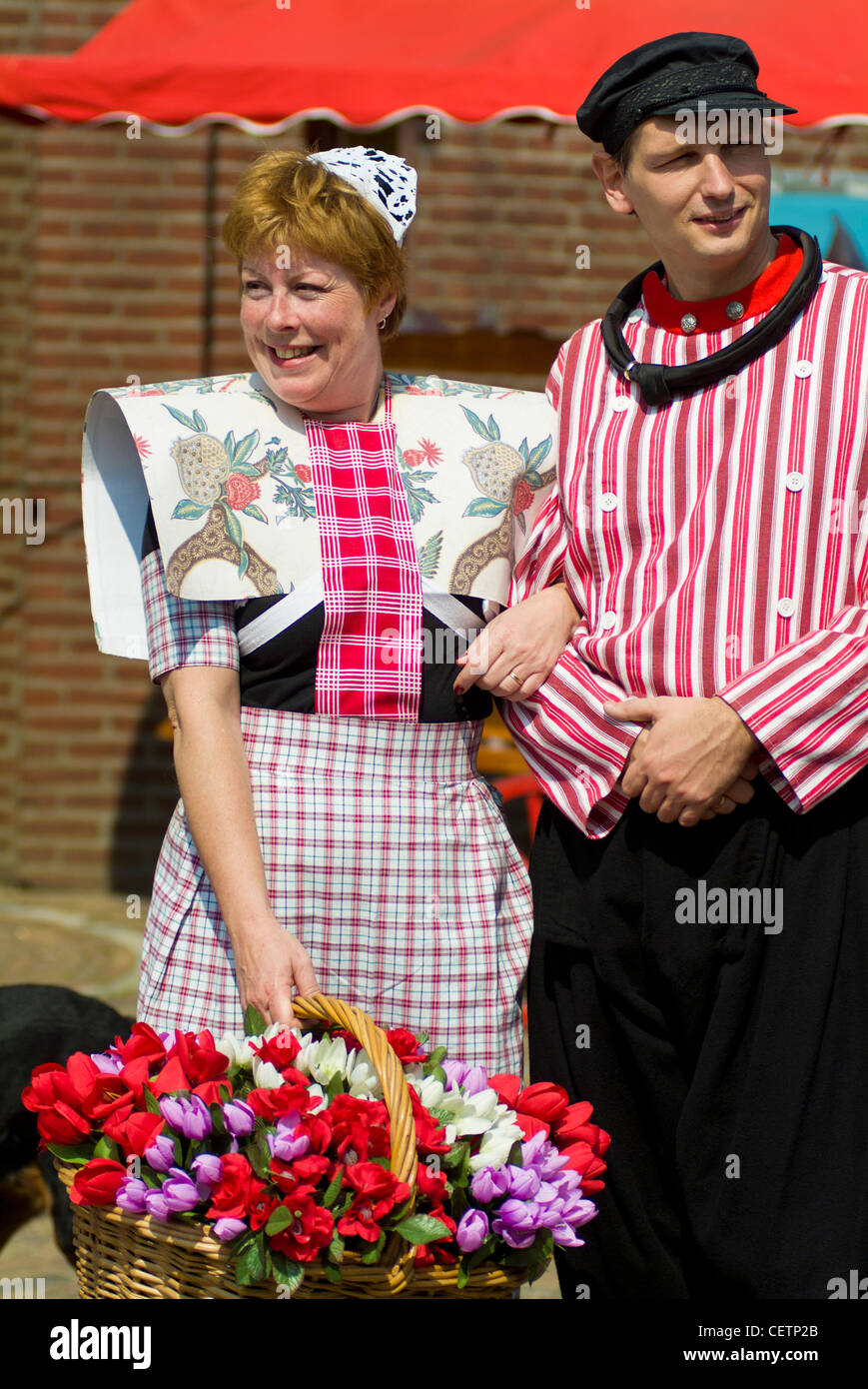 Dutch couple in traditional national costume Keukenhof gardens Lisse Holland netherlands EU Europe Stock Photo