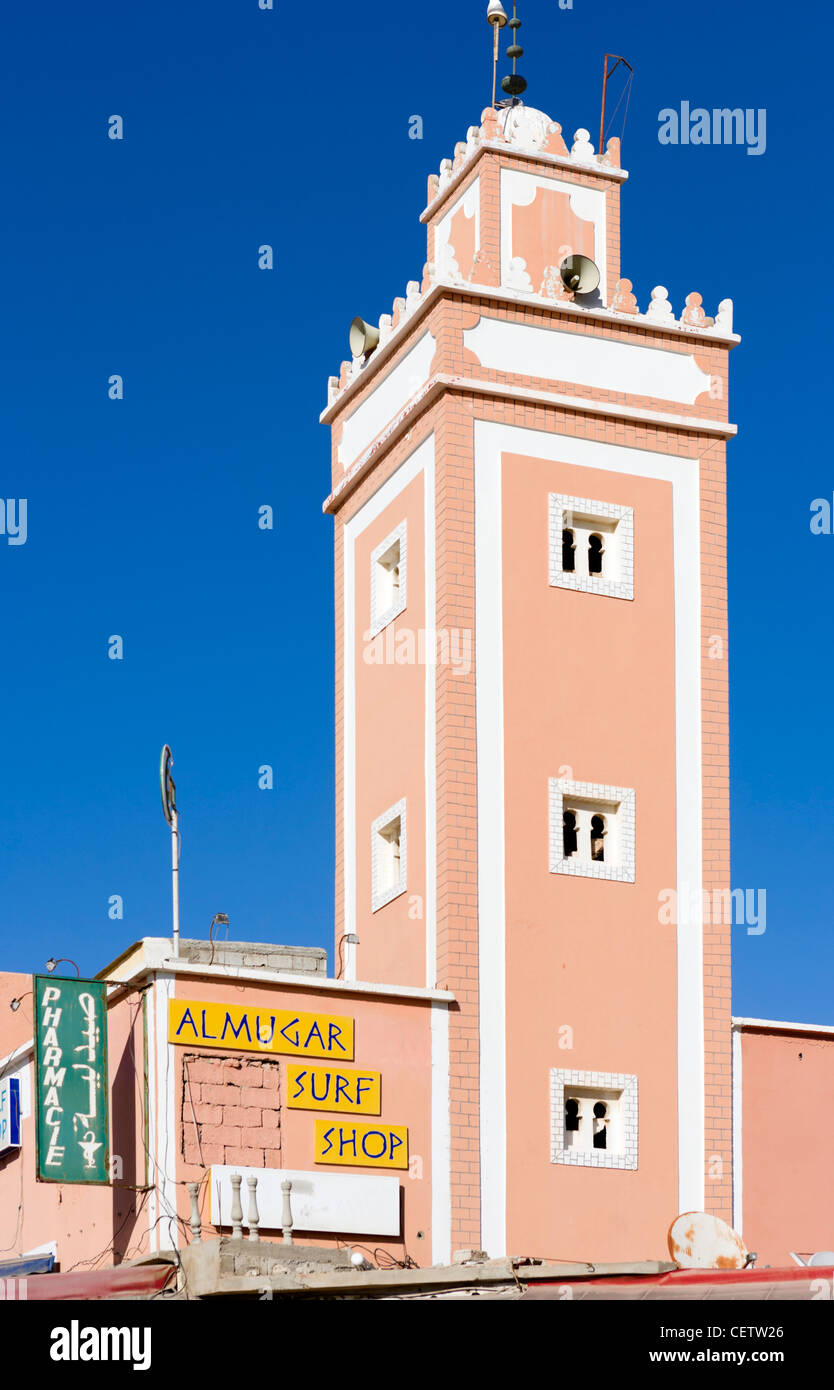 Minaret and Surf shop in the centre of the village of Taghazout, near Agadir, Morocco, North Africa Stock Photo