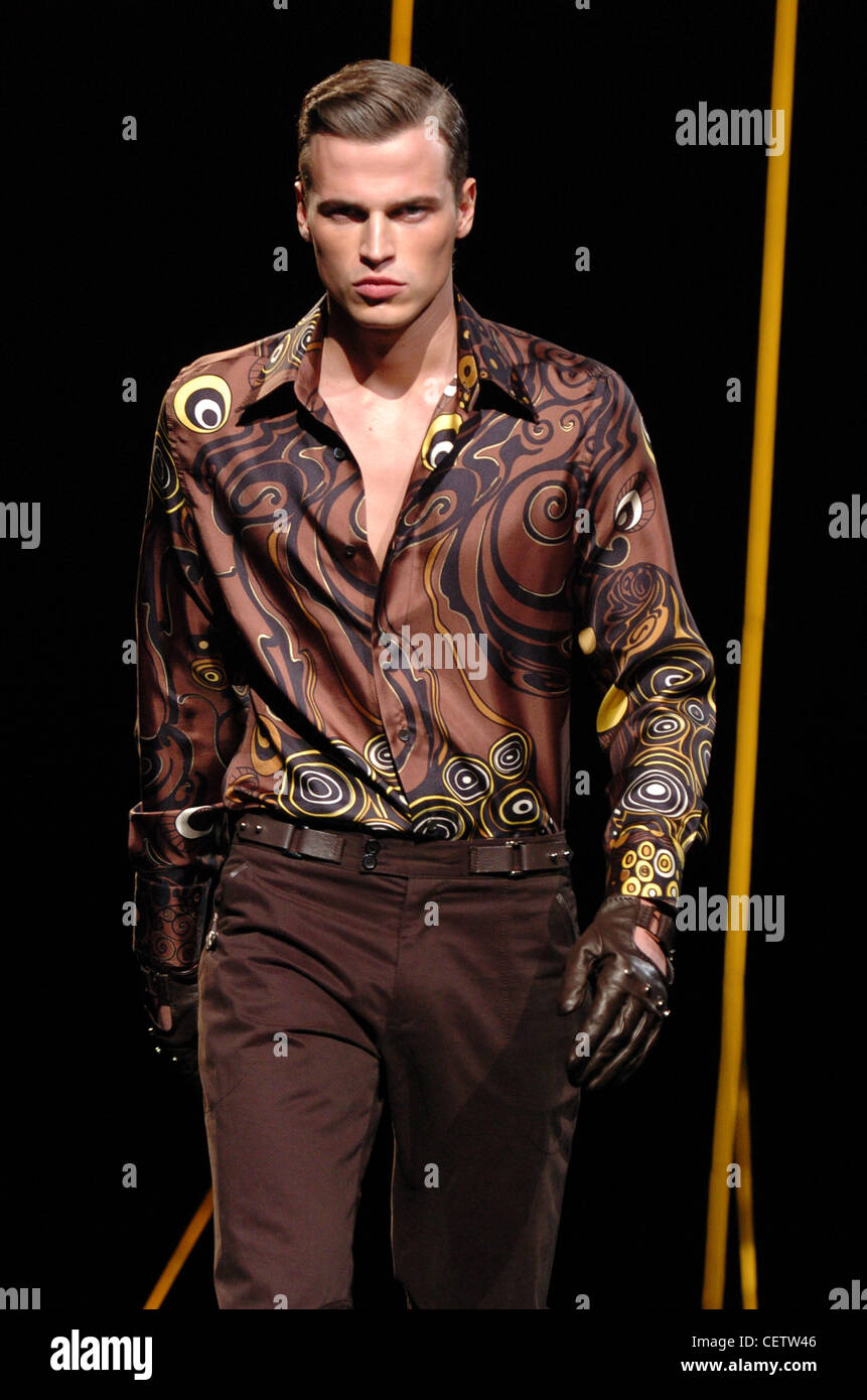 Versace Milan Menswear Ready to Wear Autumn Winter Brown bold print shirt  and brown trousers Stock Photo - Alamy