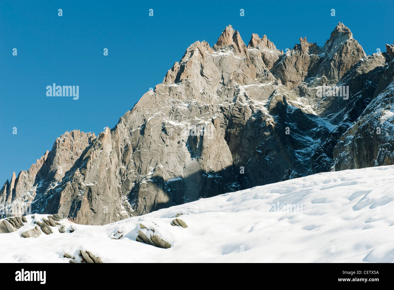 Mountain peaks and snowy landscape Stock Photo