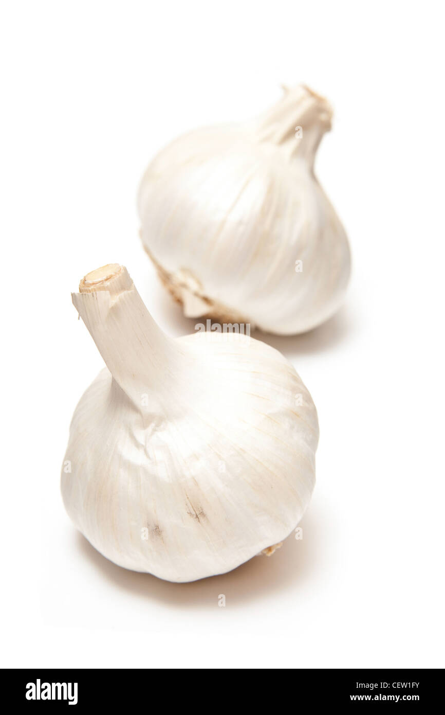 Garlic bulbs isolated on a white studio background. Stock Photo