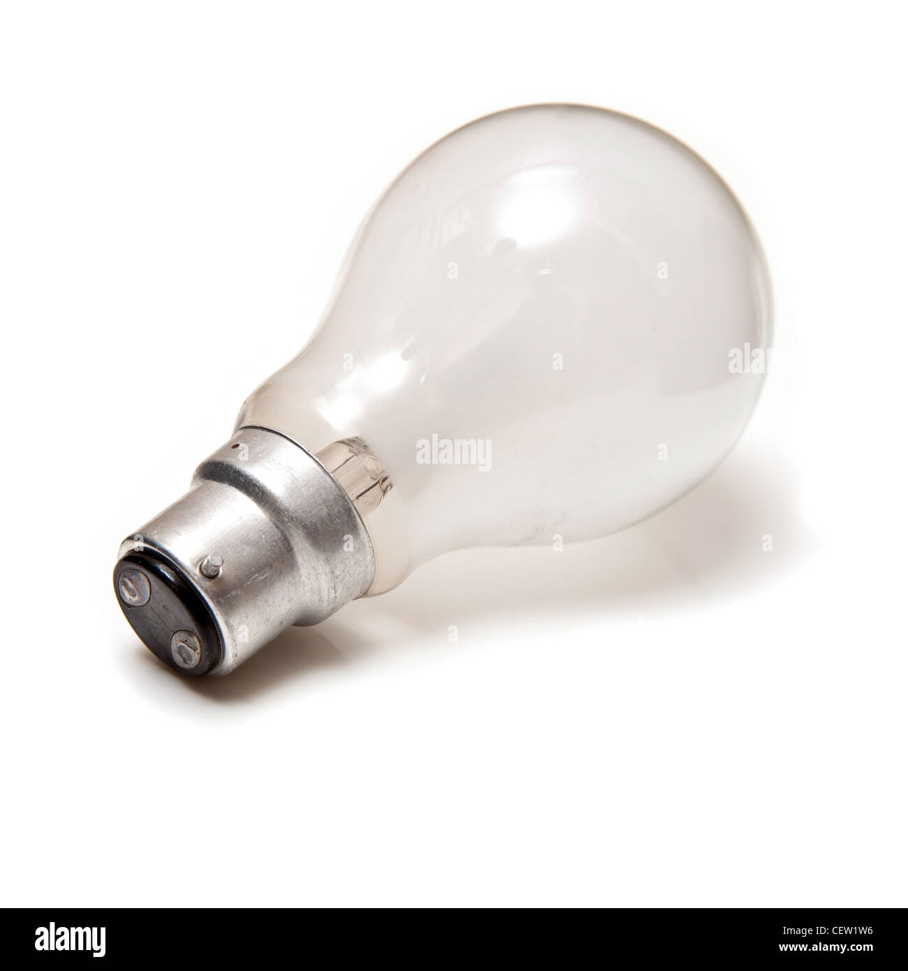 Traditional tungsten light bulb isolated on a white studio background. Stock Photo