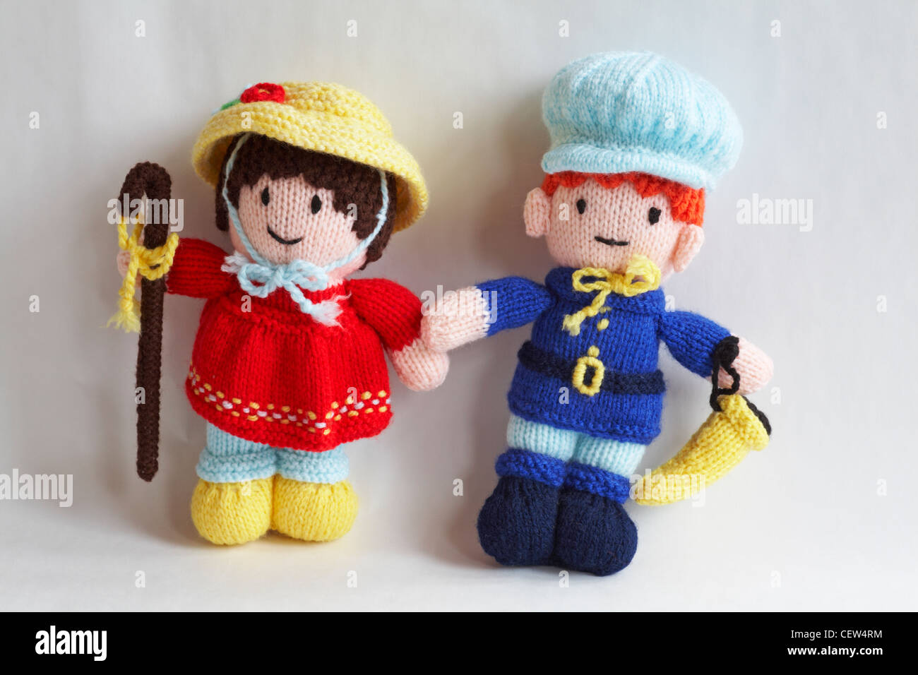 knitted dolls, knitted toys - little Bo Peep and little Boy Blue isolated on white background - knitted doll, knitted toy Stock Photo