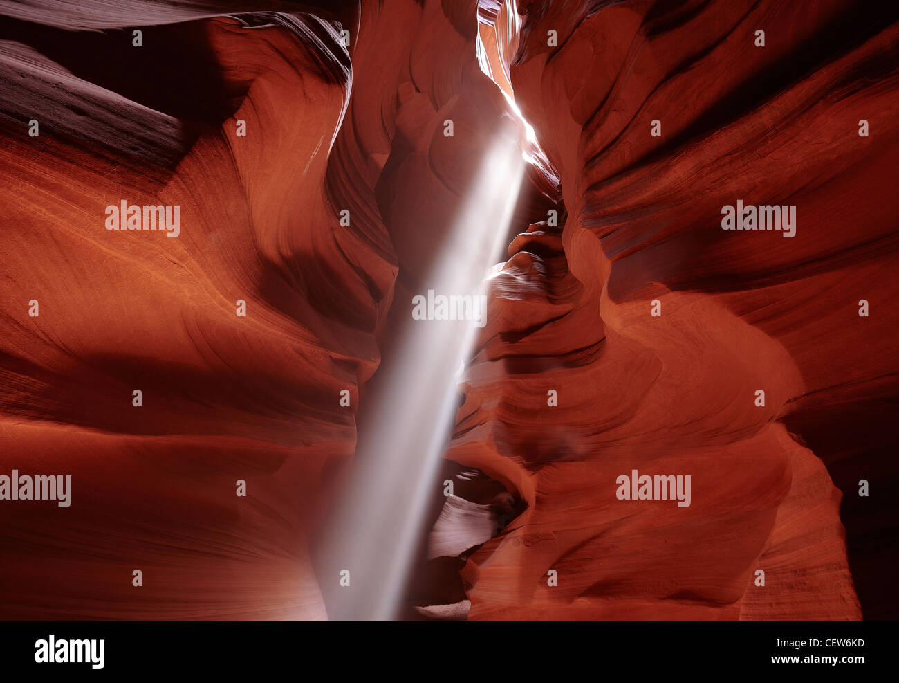 Shafts of sunlight streaming into the Antelope Canyon slot canyon, Arizona, USA Stock Photo