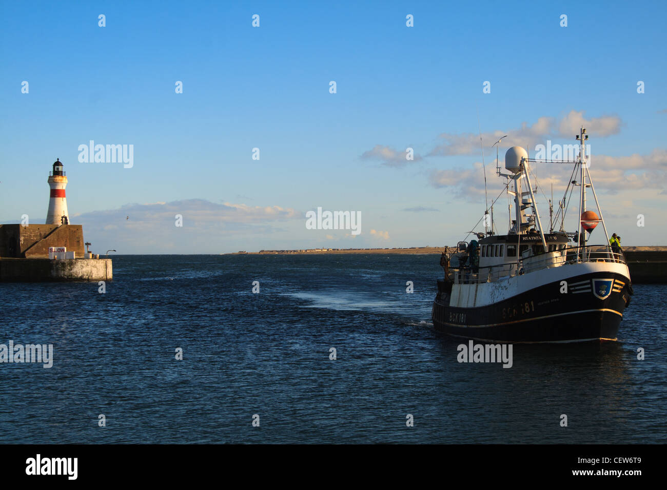 fishing boat entering fraserburgh harbour Stock Photo - Alamy