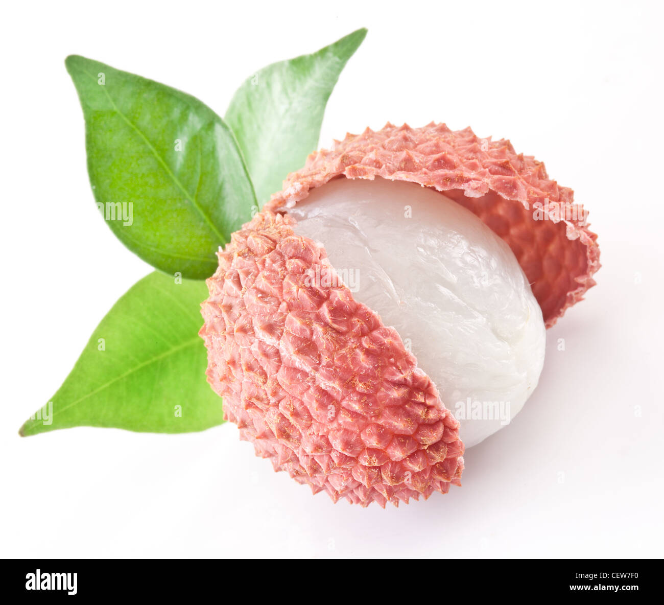 Lychee with leaves on a white background. Stock Photo
