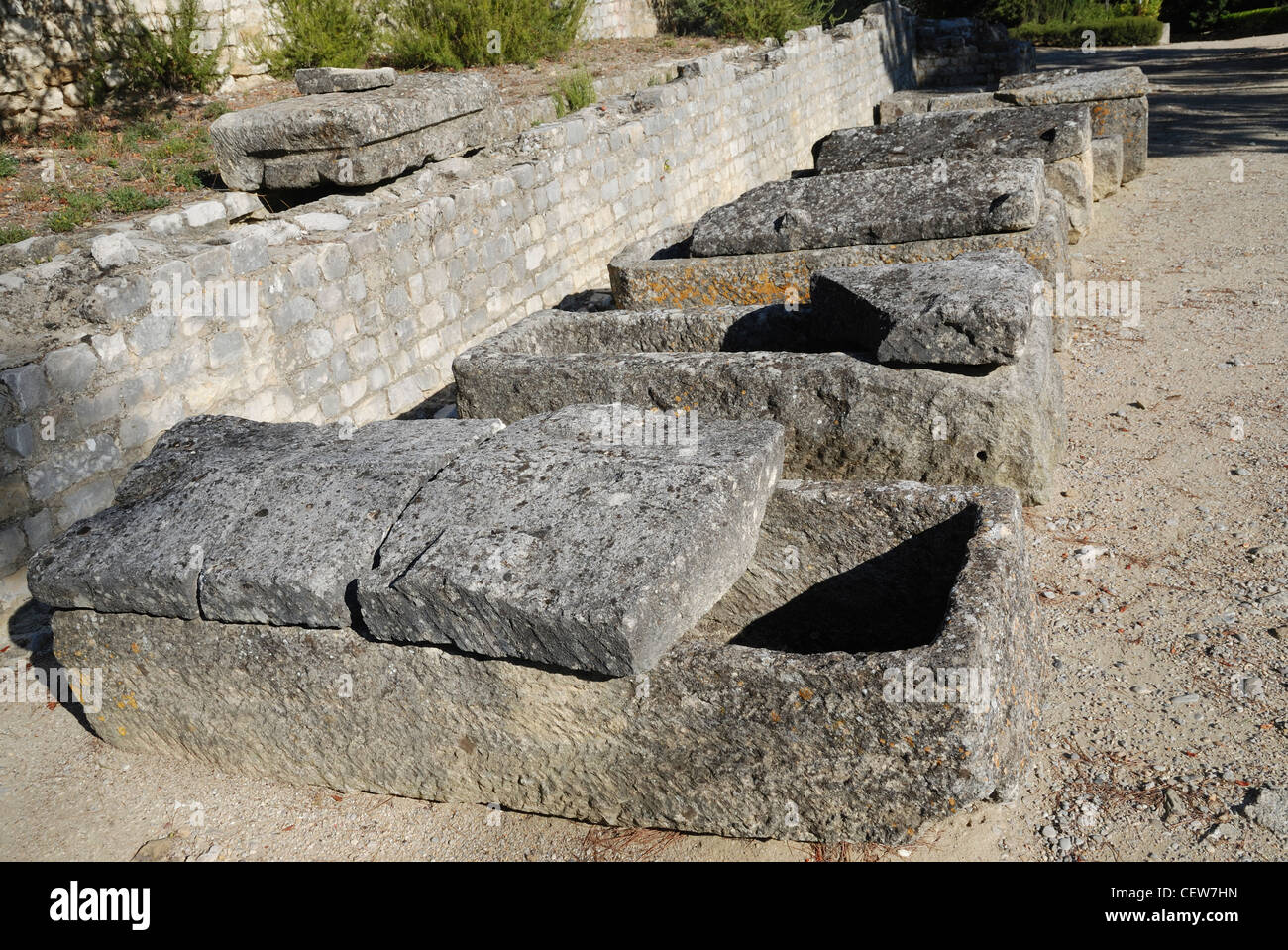 Stone coffins at the Roman archaeological site of Puymin at Vaison-la-Romaine, Vaucluse, Provence, France. Stock Photo