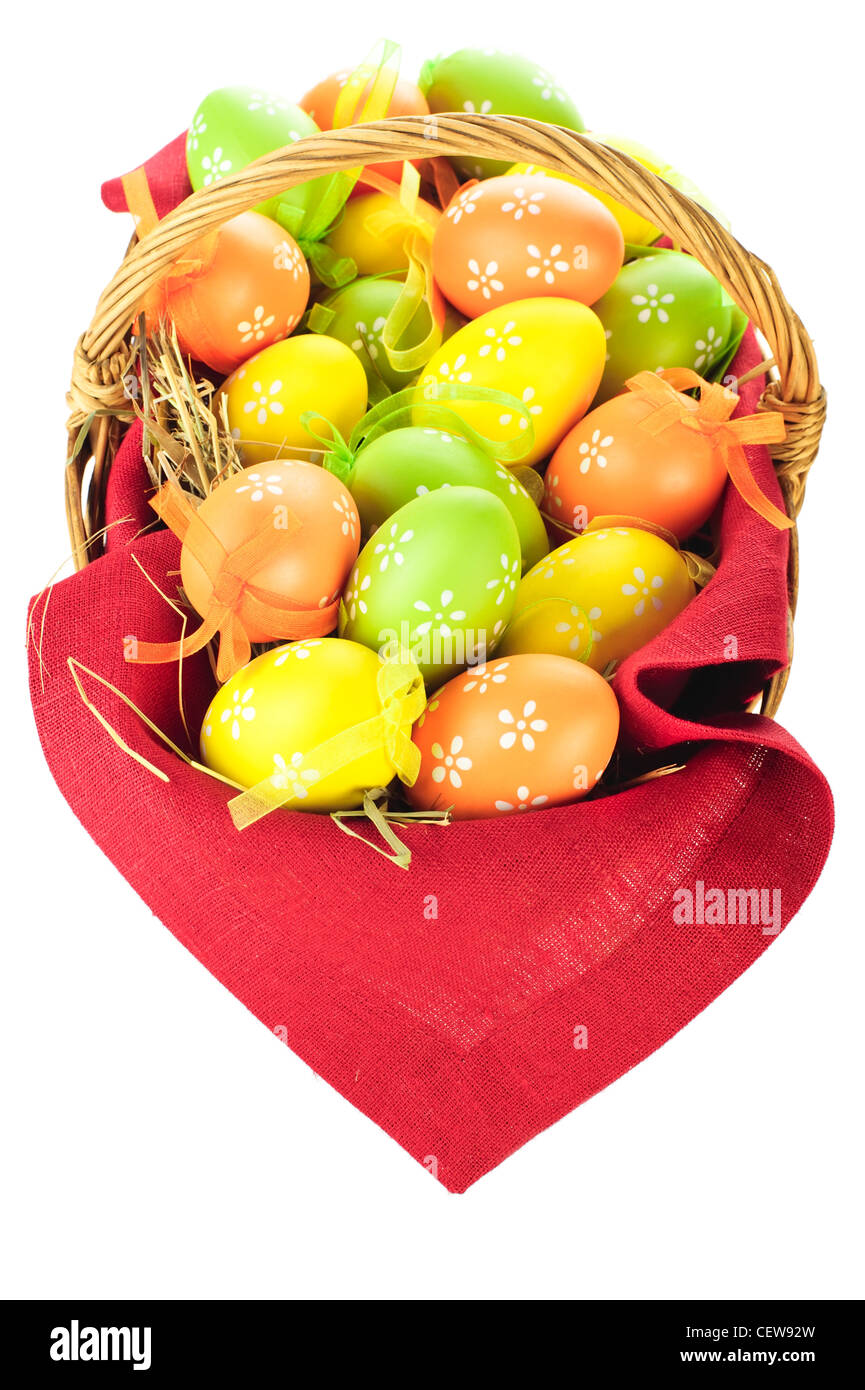 Painted easter eggs in basket isolated on white background Stock Photo ...