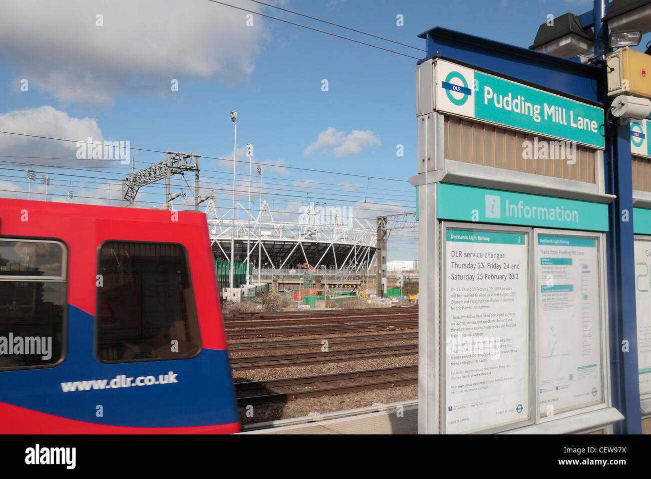 a-dlr-train-arrives-at-pudding-mill-lane-dlr-railway-station-with-the