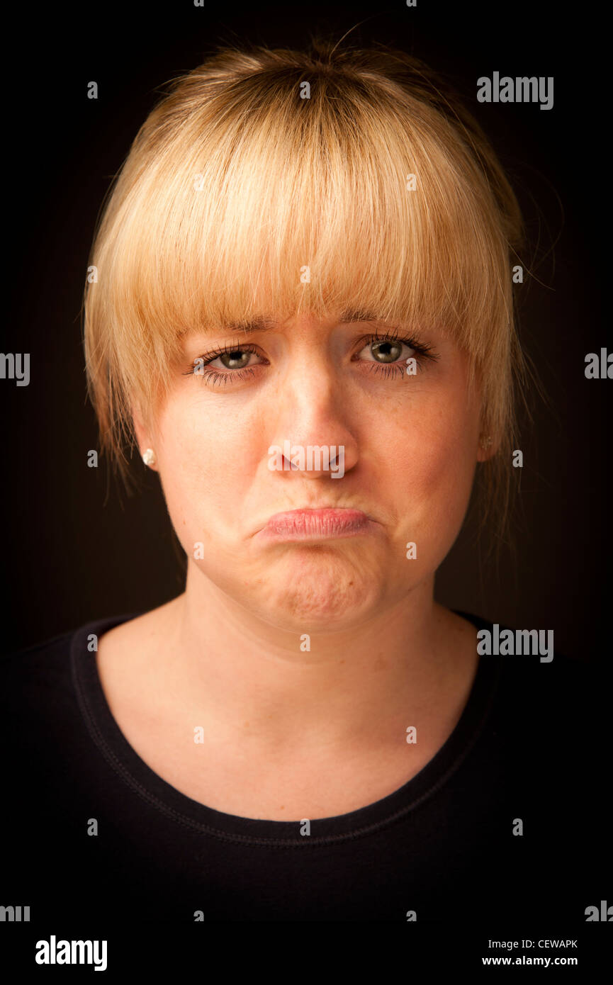 Frowning face hi-res stock photography and images - Alamy