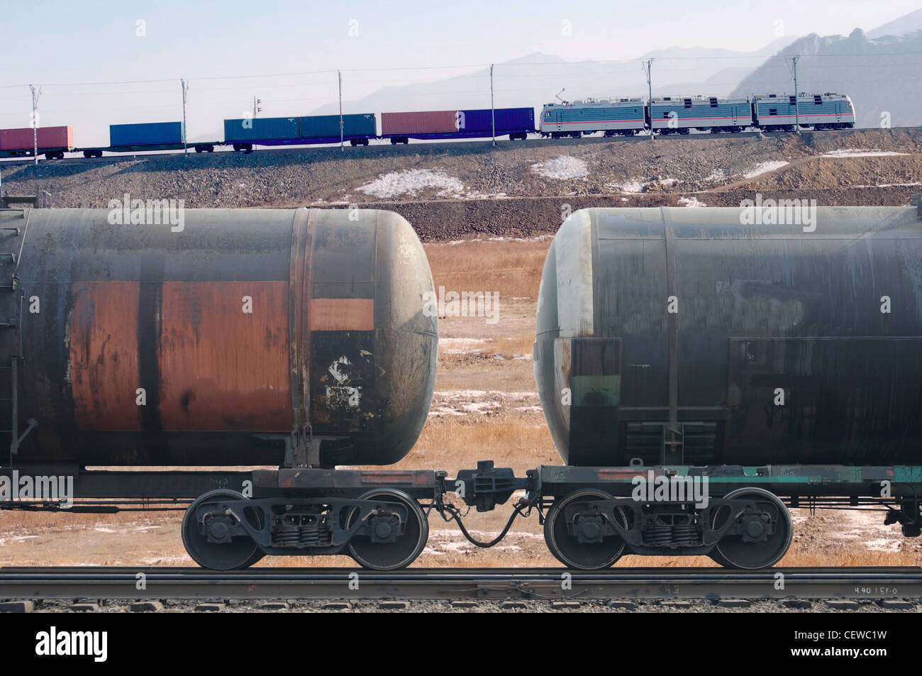 Freight train with cargo containers and tanks Stock Photo