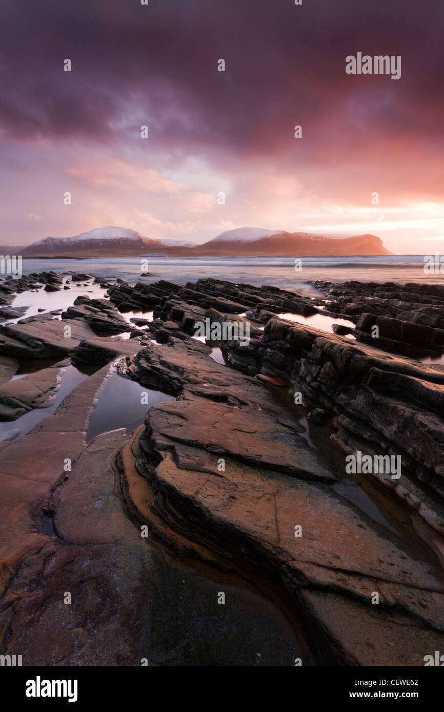 Warebeth rocky beach with Hoy behind, Orkney Stock Photo