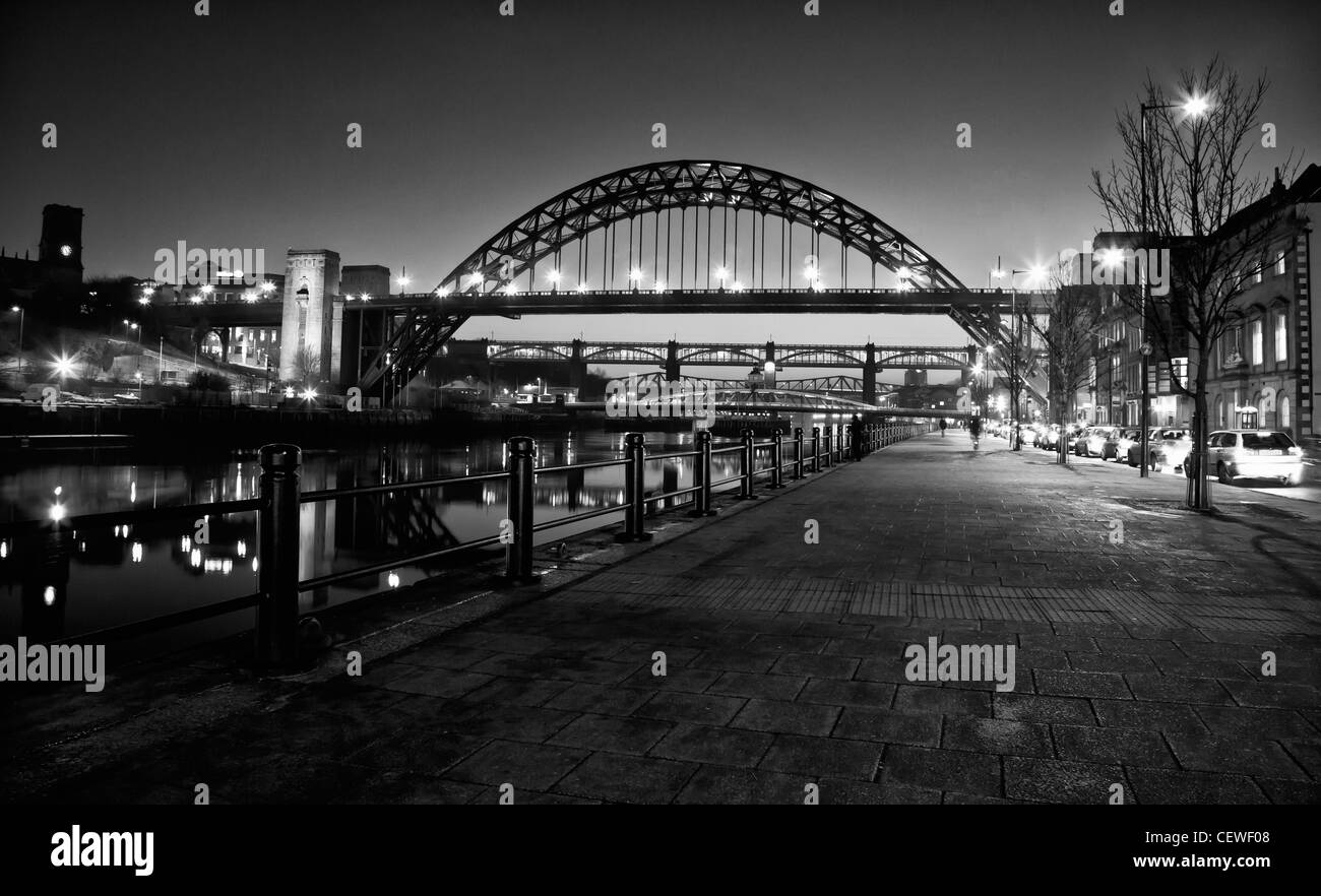 Black and white photograph of tyne bridge at night in newcastle upon tyne in newcastles popular quayside distrct