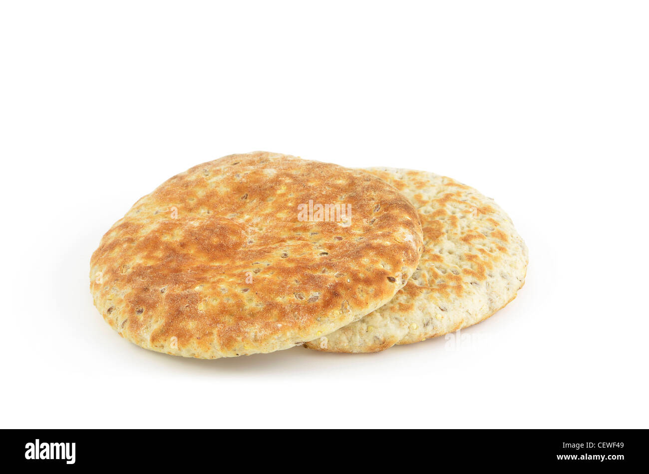 Whole grain pita bread rounds on white background Stock Photo Alamy