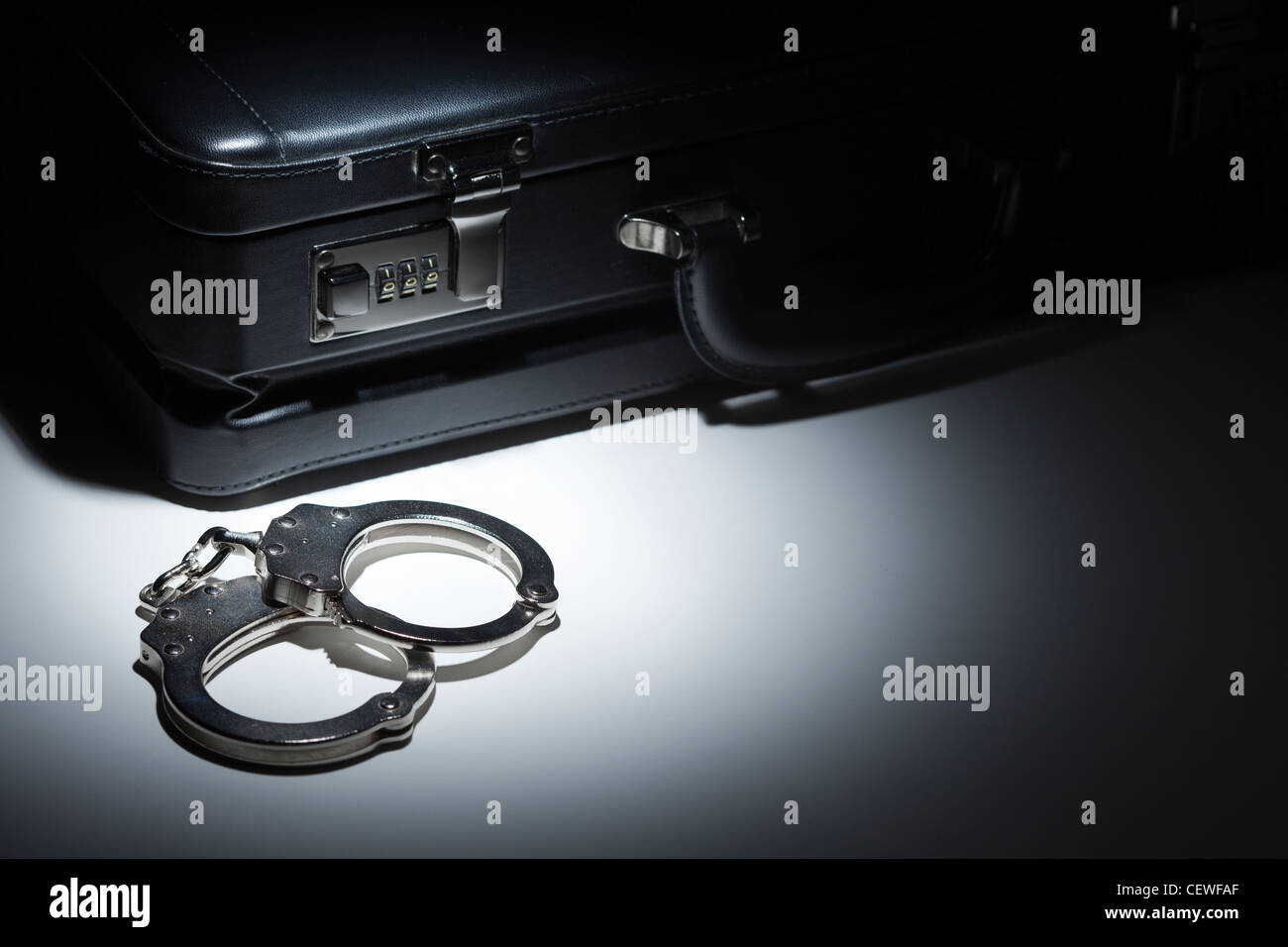 Handcuffs and briefcase hires stock photography and images Alamy