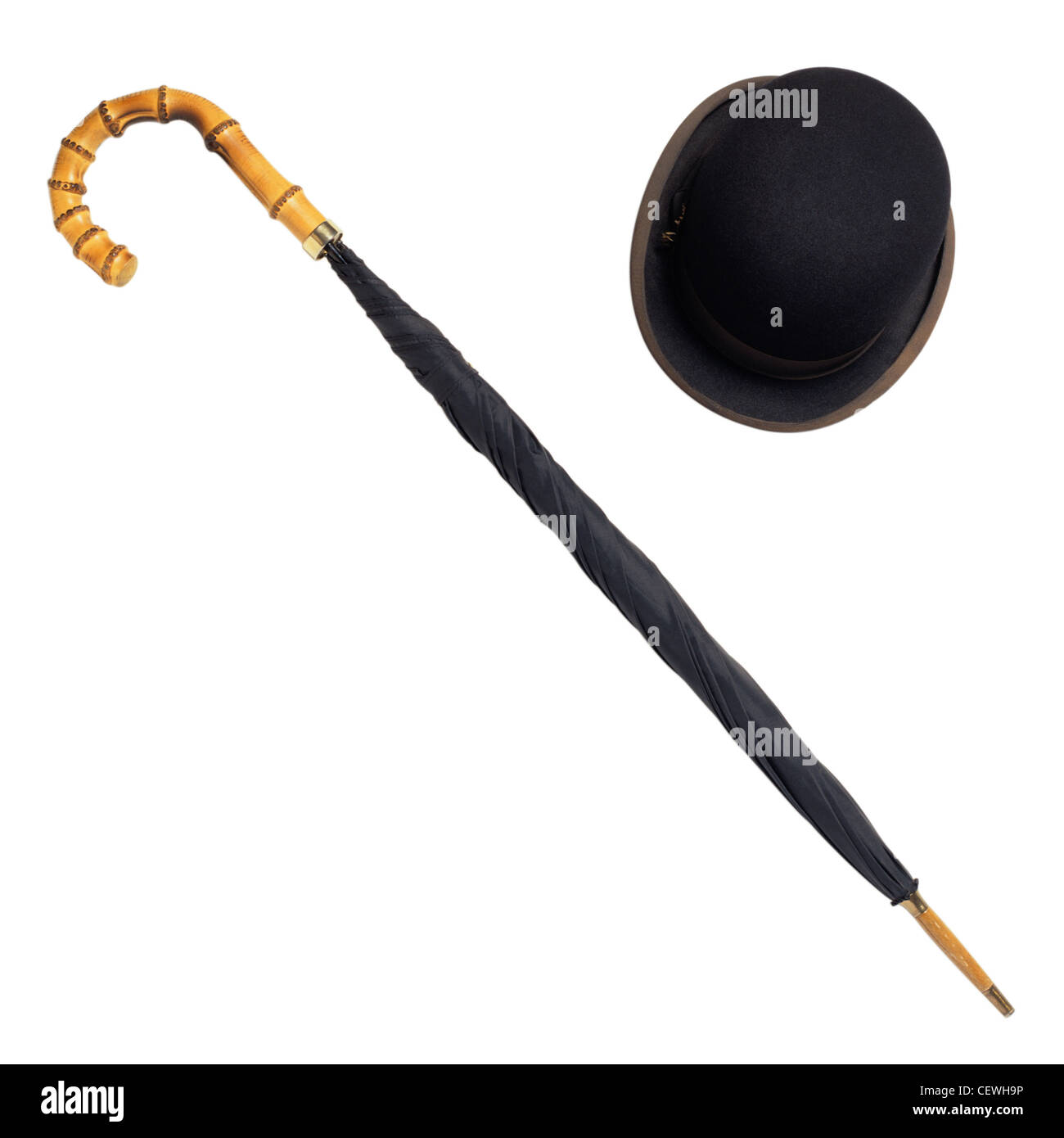 Bowler hat and umbrella on white Stock Photo Alamy