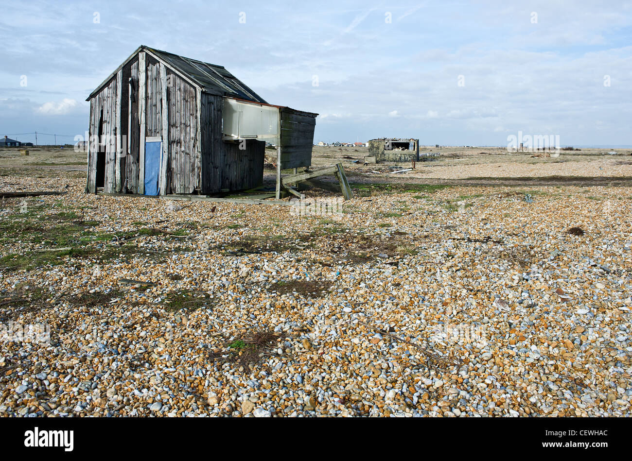 Old wooden hut on Dungeness beach in Kent. Stock Photo
