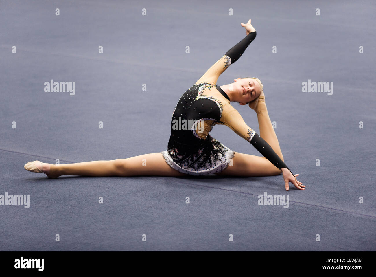Female gymnast performing floor routine Stock Photo Alamy