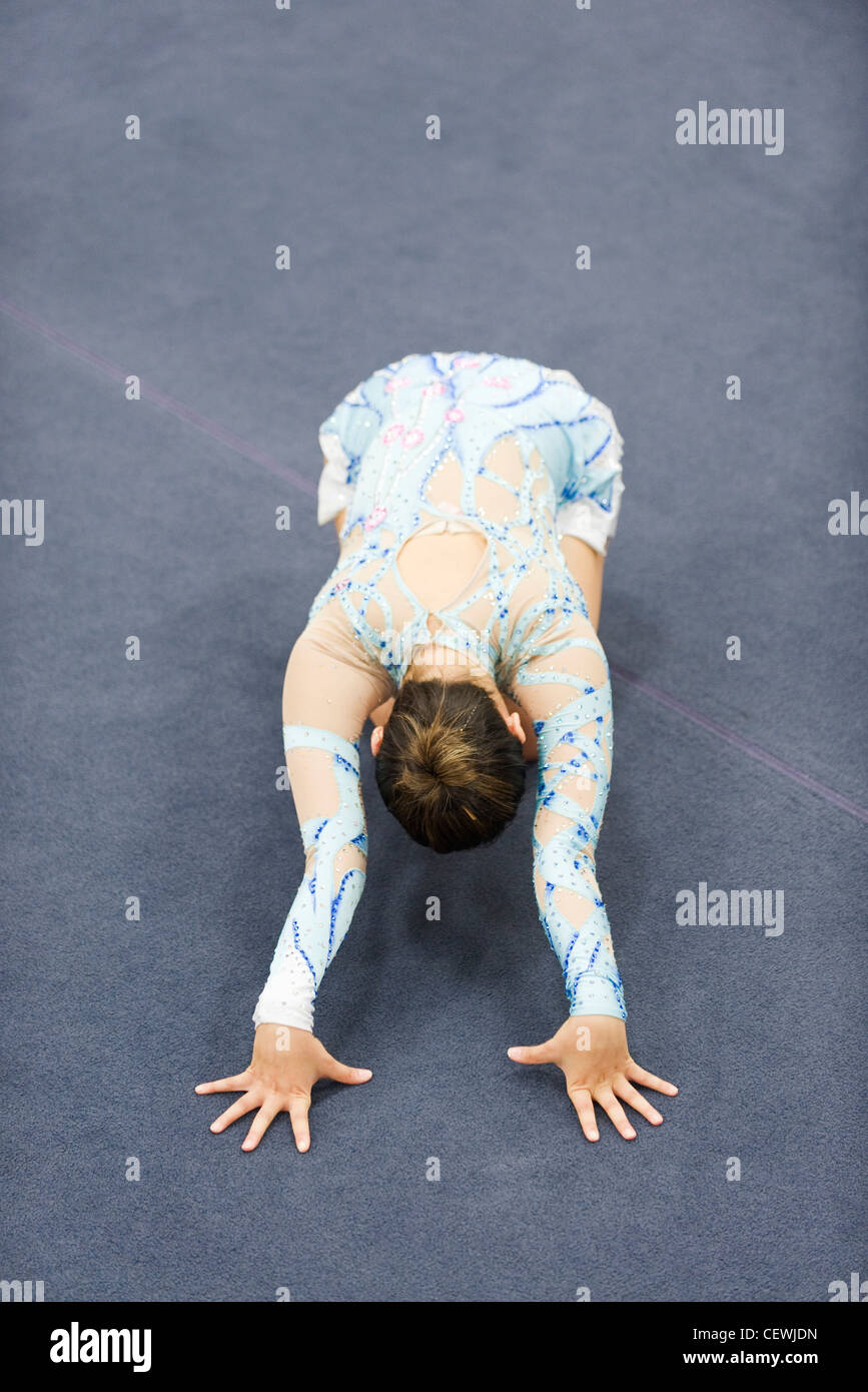 Female gymnast performing floor routine Stock Photo