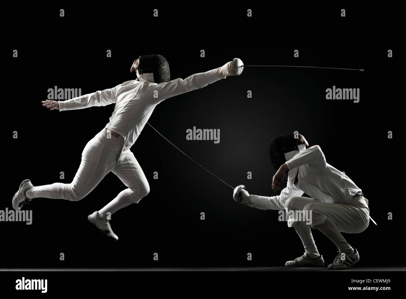 Fencers fencing Stock Photo