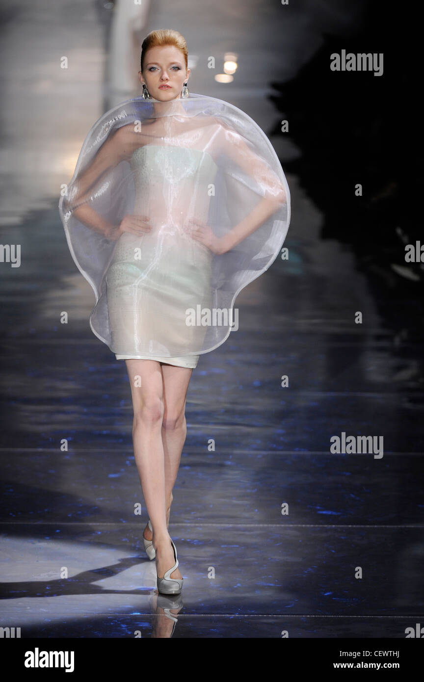 Armani Prive Paris Haute Couture Ready to Wear Spring Summer Model wearing  a white organza moon shaped dress over a strapless Stock Photo - Alamy