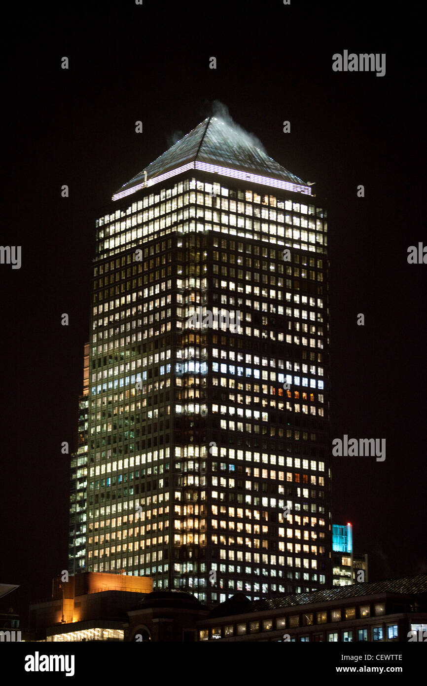 Office buildings illuminated at night at Canary Wharf , London Stock ...