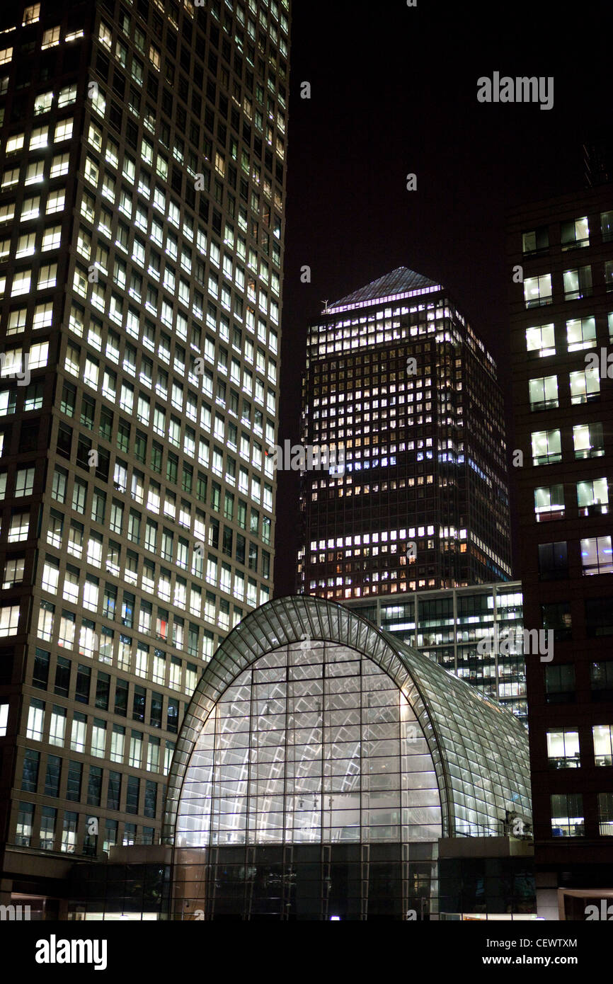 Office buildings illuminated at night at Canary Wharf , London Stock ...