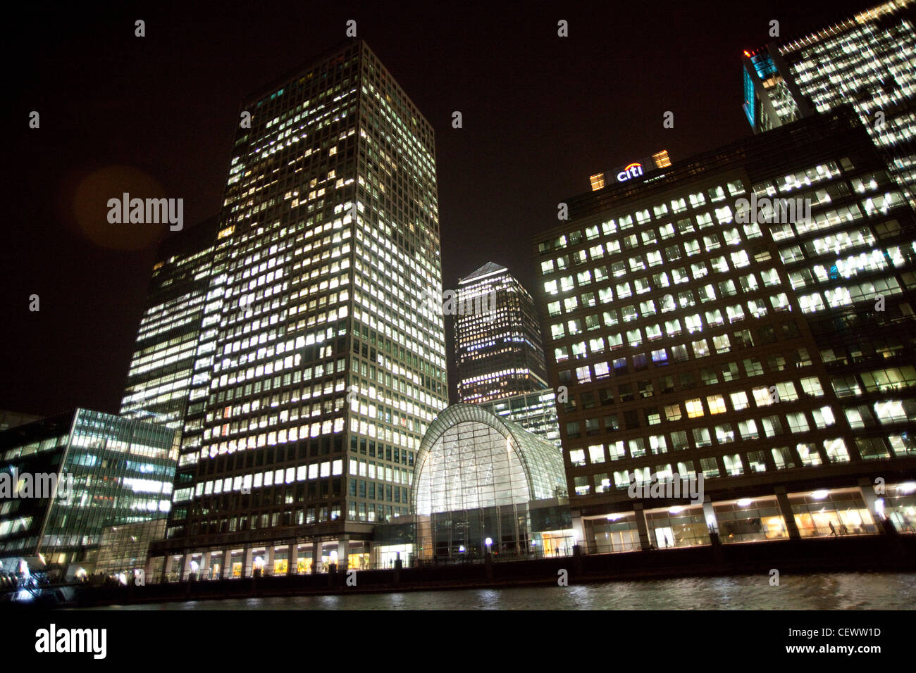 Office buildings illuminated at night at Canary Wharf , London Stock ...