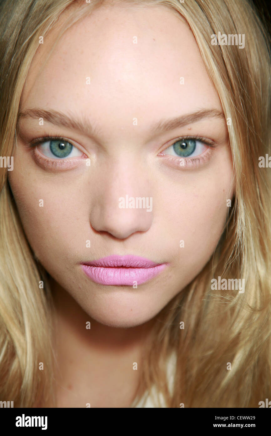 Miu Miu Backstage Milan Autumn Winter Blonde hair minimal eye make up,  opaque pale pastel mauve pink lipstick Stock Photo - Alamy