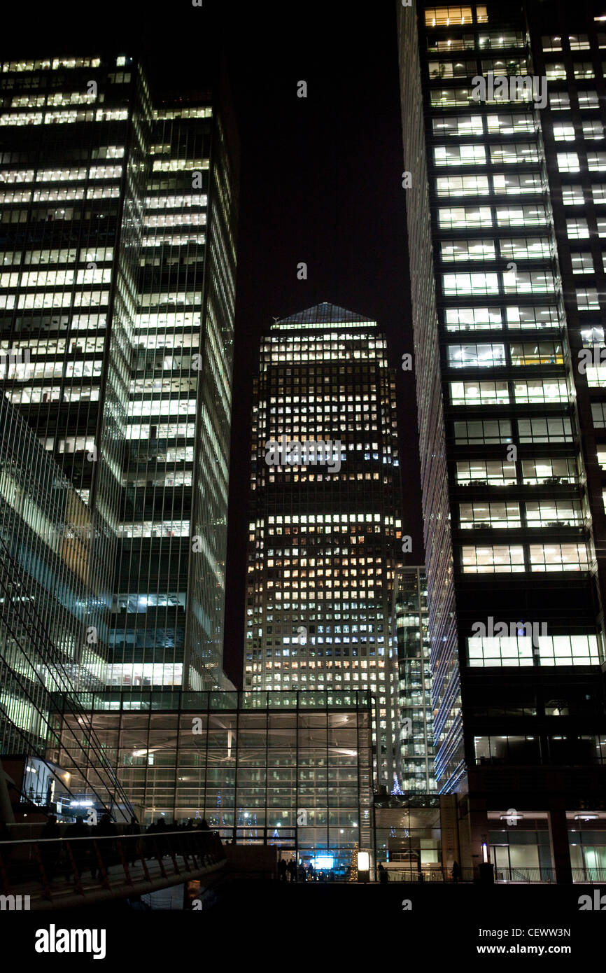 Office buildings illuminated at night at Canary Wharf , London Stock ...
