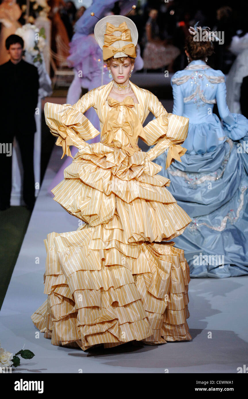 Dior Paris Haute Couture Autumn Winter Model wearing yellow and white ...