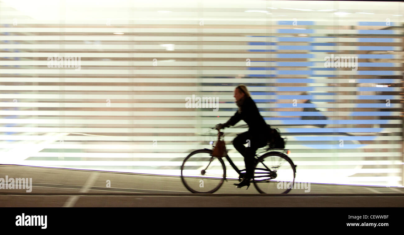cyclist at night in Frankfurt Stock Photo