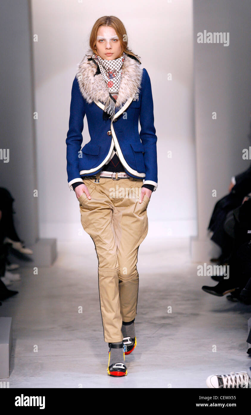 a Balenciaga Paris Ready to Wear Autumn Winter Model long blonde hair and  white flash on forehead wearing printed scarf and Stock Photo - Alamy